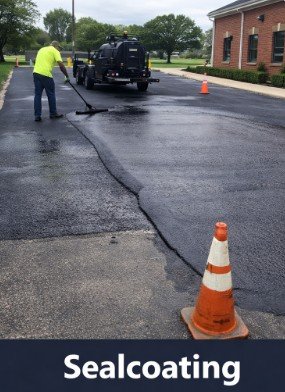 Parking lot sealcoating